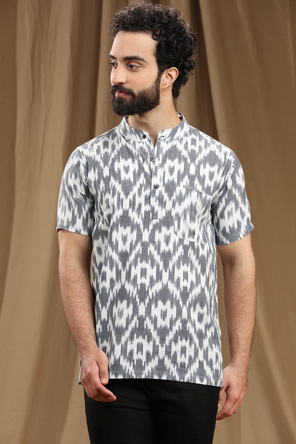 Discover the finest collection of men's cotton ikat short kurtas with half sleeves, combining trendy designs and unmatched comfort. Explore a wide range of traditional and contemporary patterns that showcase the beauty of Indian craftsmanship. Elevate your style with these exquisite kurtas, perfect for any occasion. IKAT COTTON SHORT KURTA,kurtas for men,mens kurtas,men kurtas,men short kurtas,short kurtas for men,mens short kurtas,buy kurtas online,buy online kurtas,mens half sleeves short kurtas,